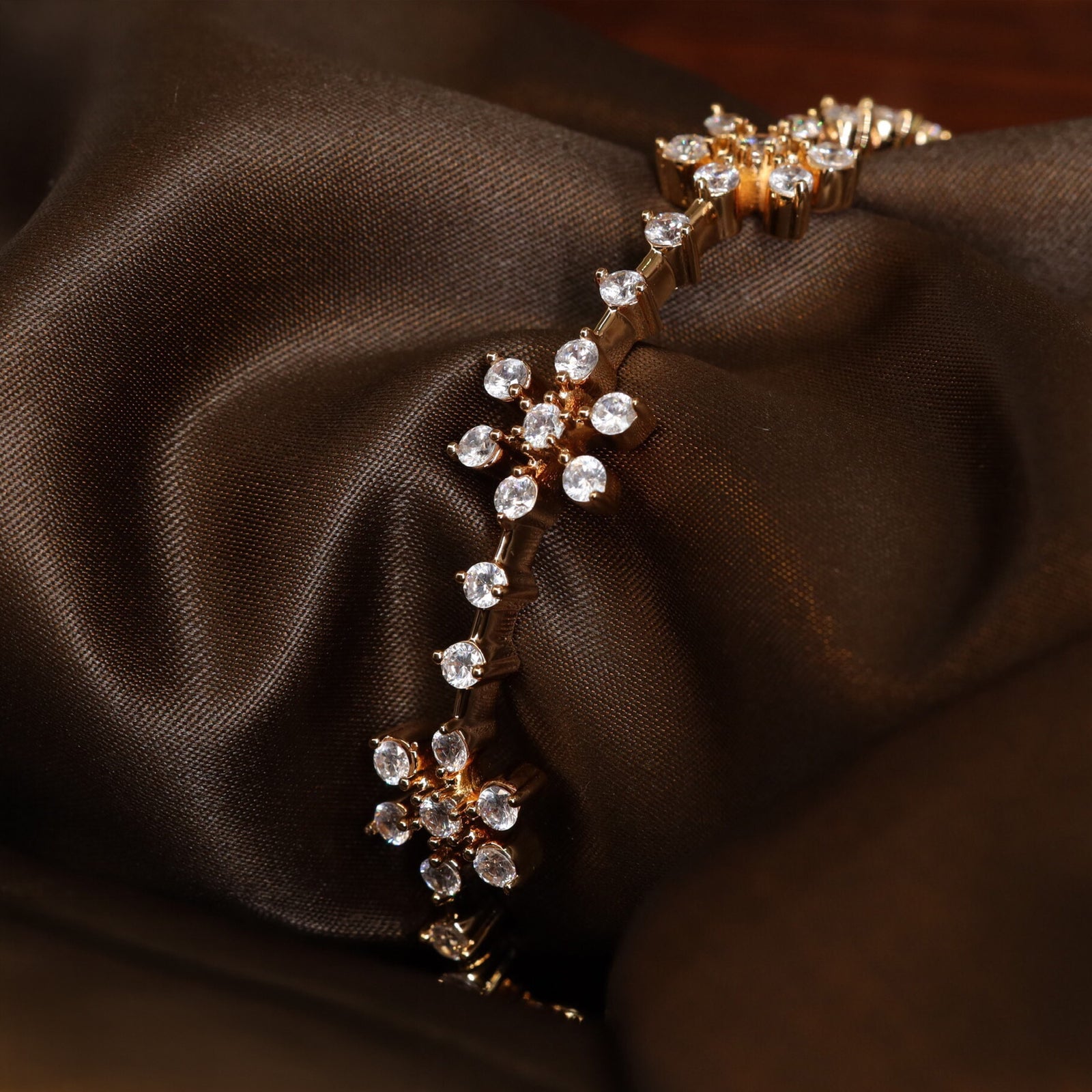 Floral Cluster Gold Finish Bangle with Linear Stone Detailing