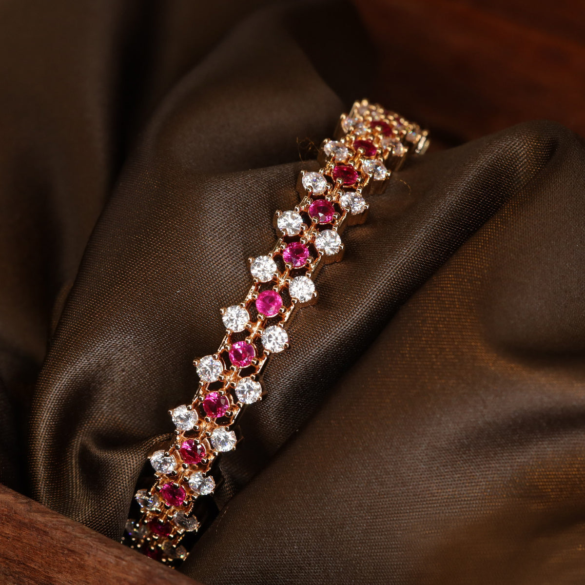 Premium Gold Tone Bangle with Repeating Floral Accent Design
