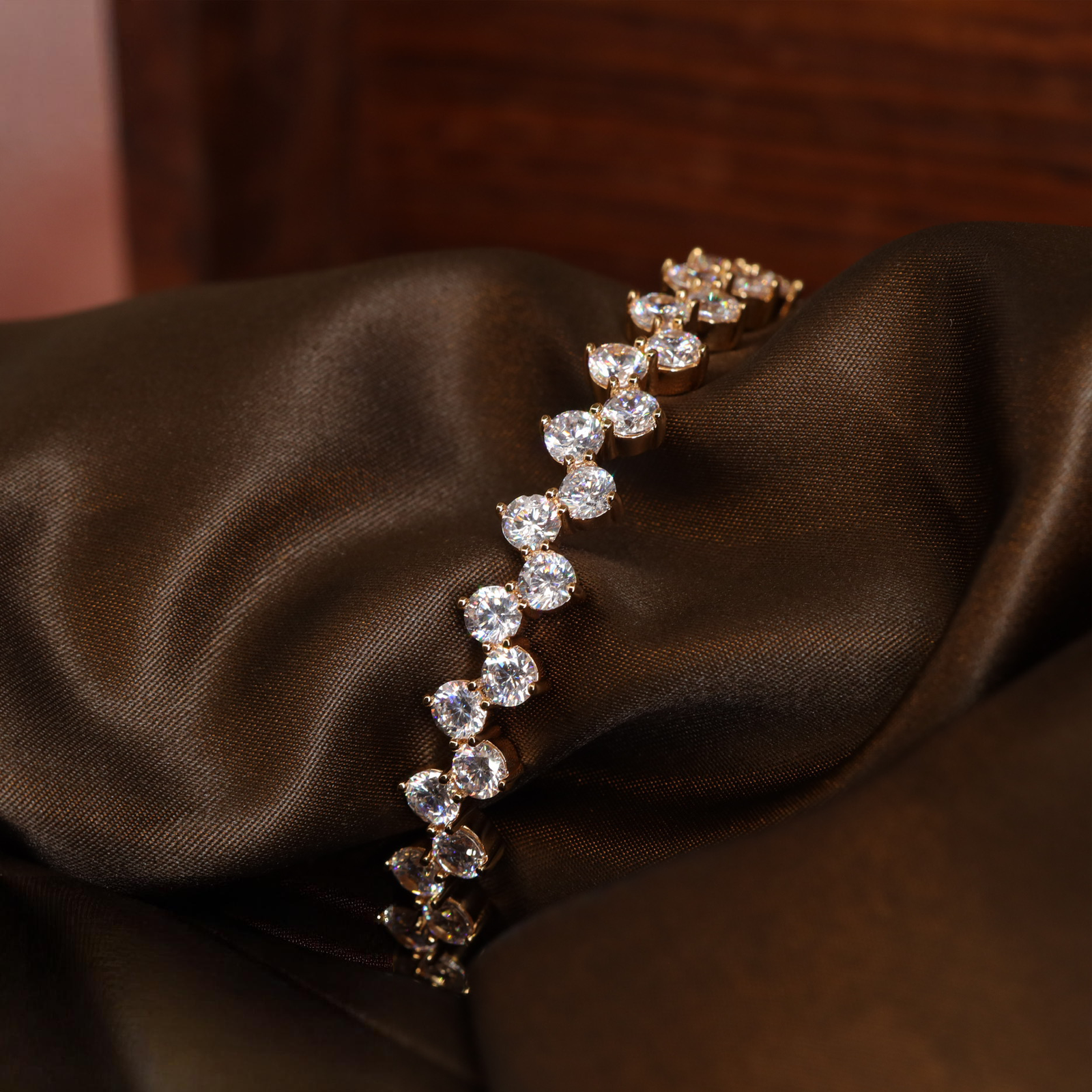 Sleek Gold Tone Bangle with Uniform Round Stone Alignment