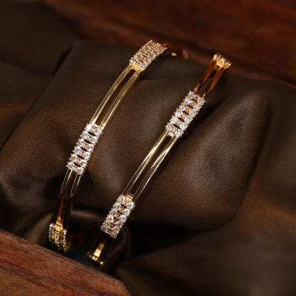 Structured Twin Line Bangles with Center Stone Clusters