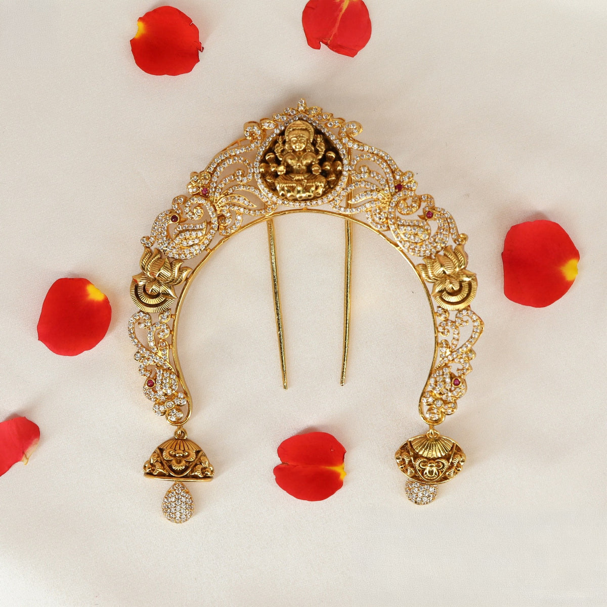 Heritage antique arch with Lakshmi detailing and ornate hanging drops