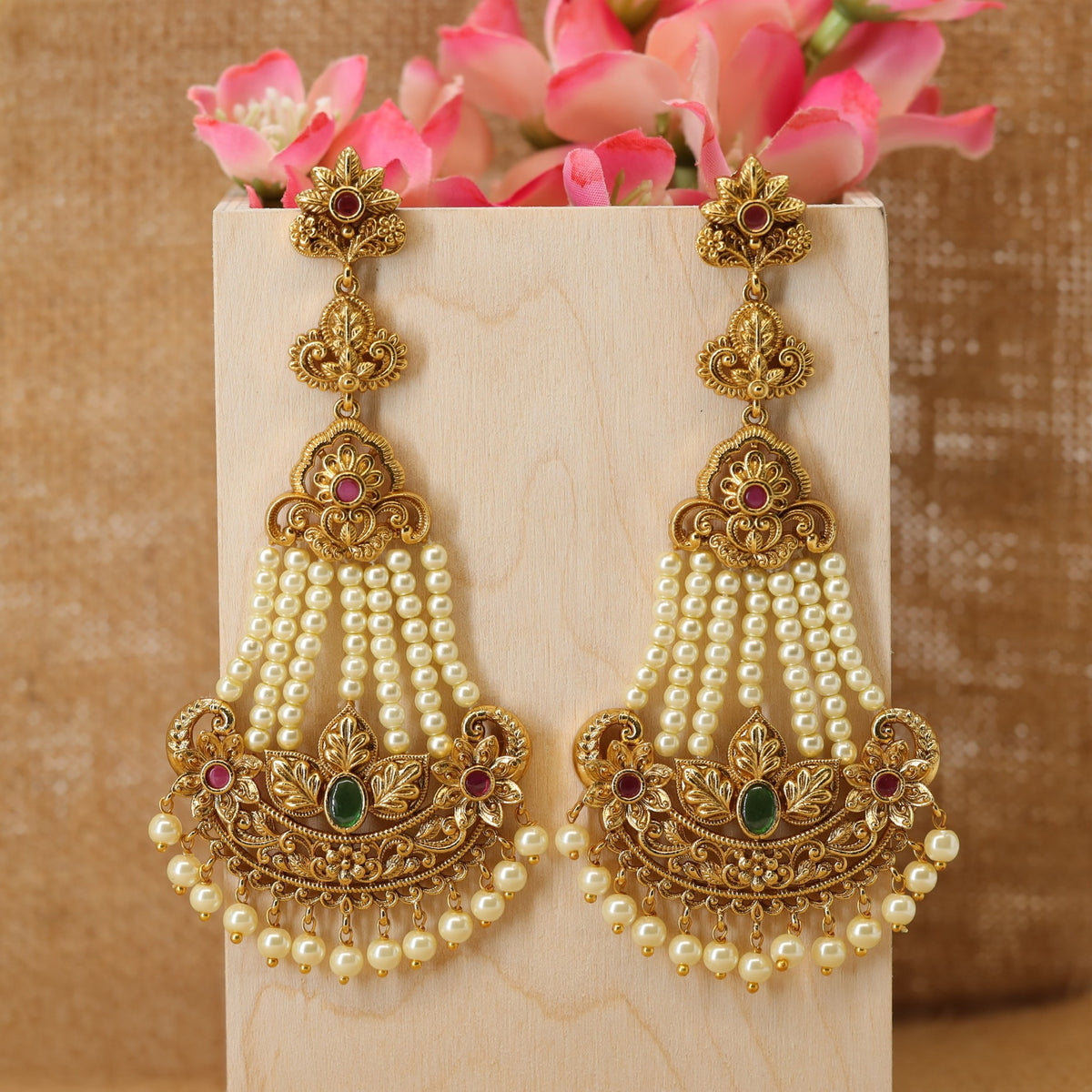 Graceful traditional hangings with detailed pearl accents