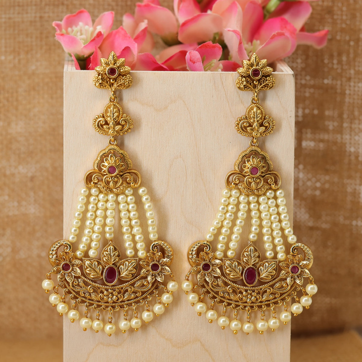 Graceful traditional hangings with detailed pearl accents