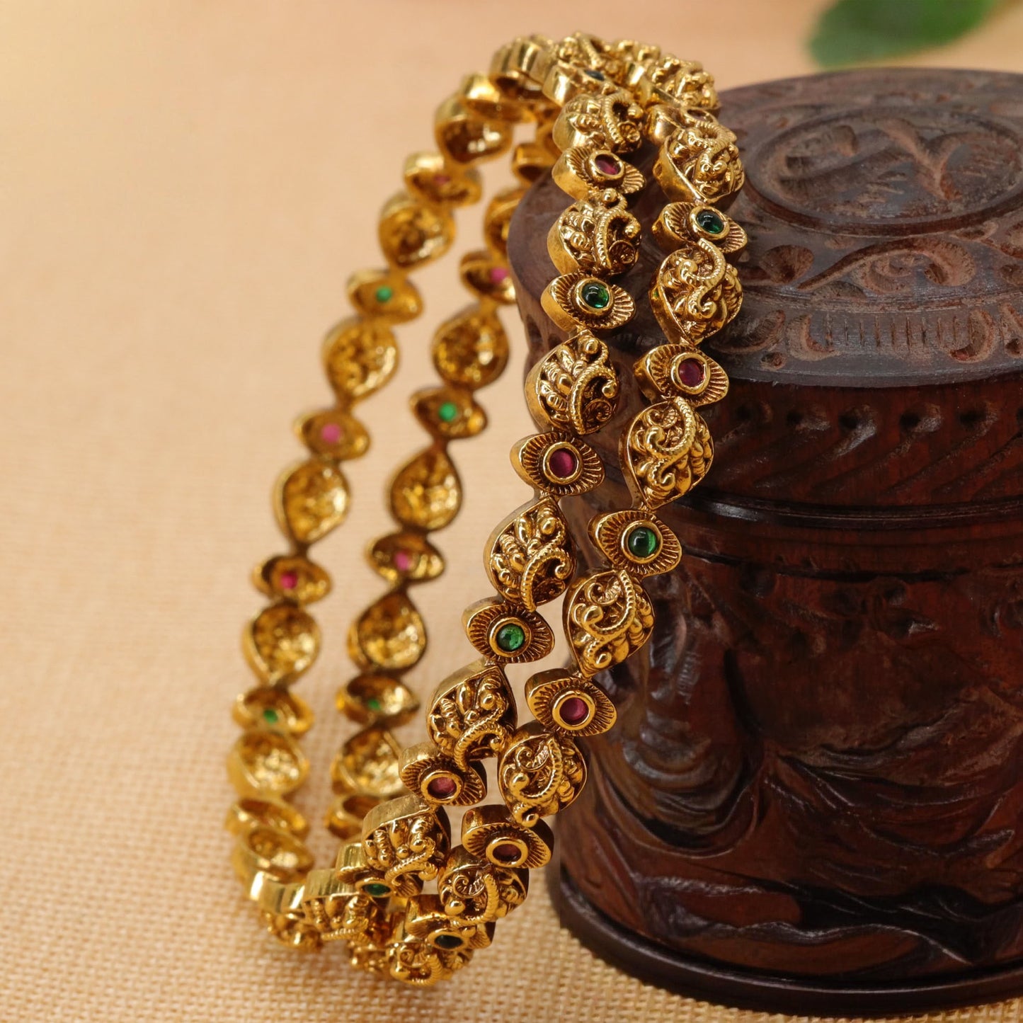 Regal Paisley Motif Bangles with Intricate Swirl Carving and Leaf Accents