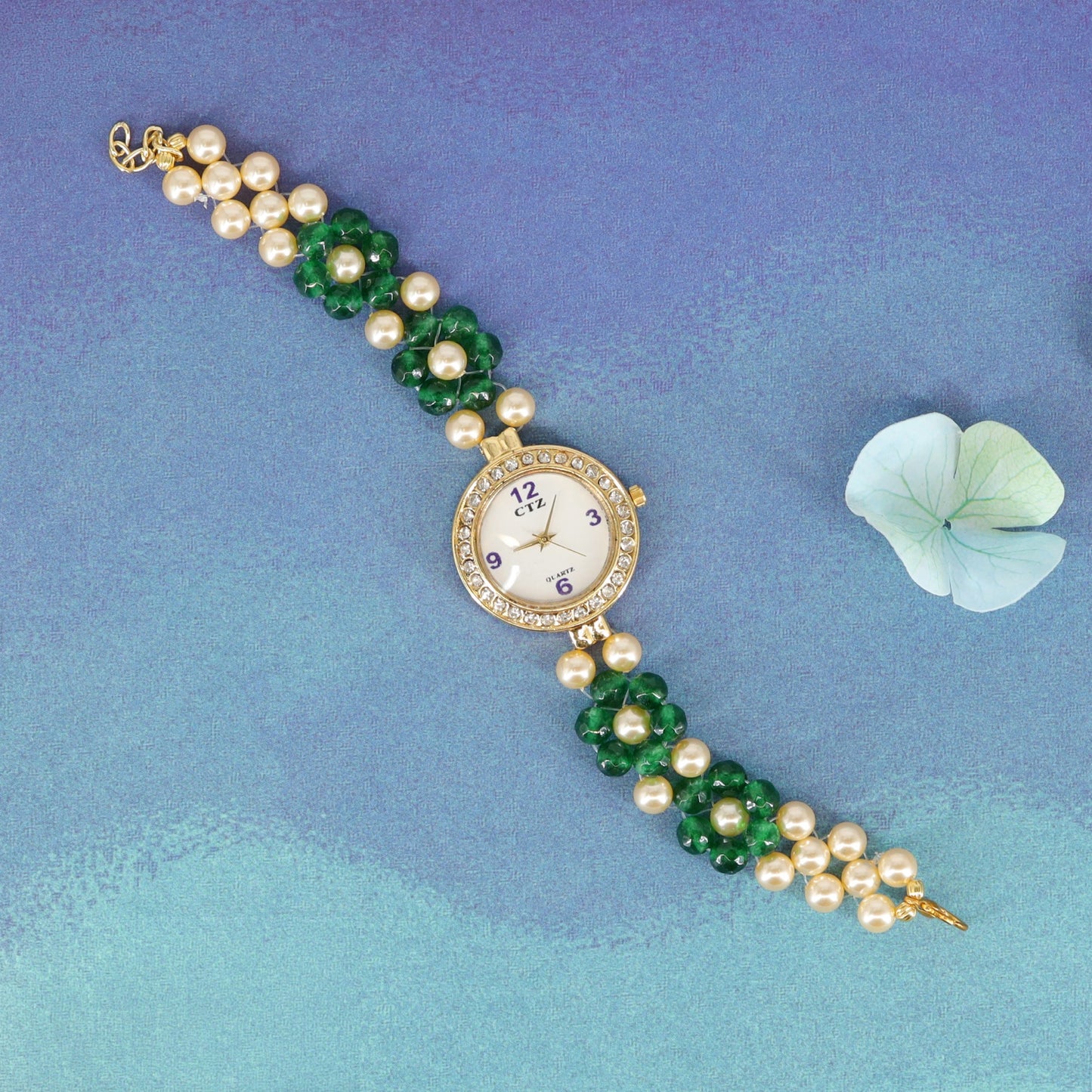 Beads watch with pearl clusters and woven bead bracelet design