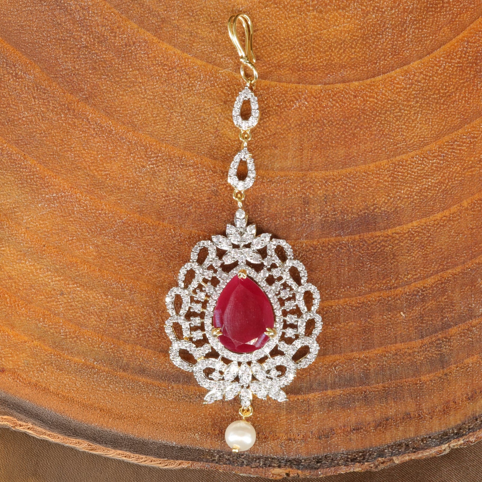 Intricate Frame Tikka with Central Highlight and Decorative Border Work