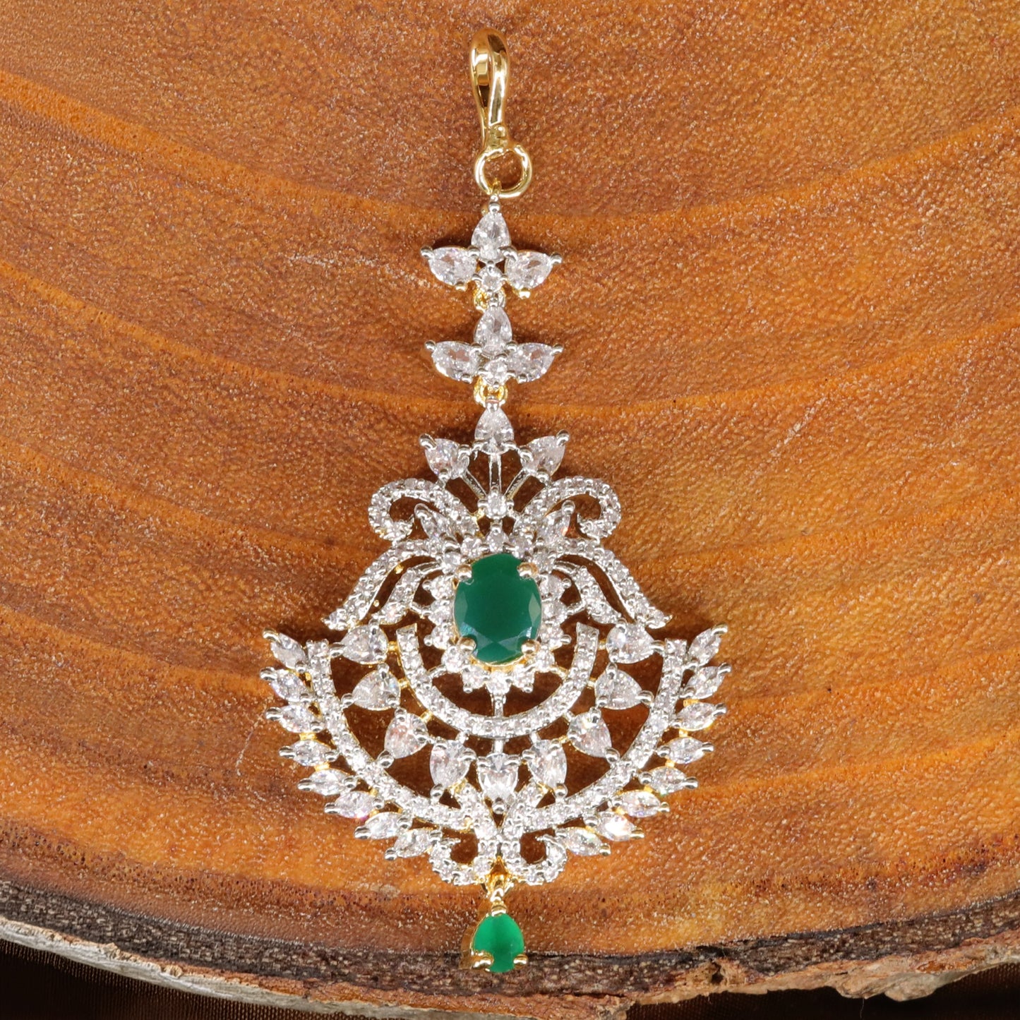Radiating Floral Tikka with Layered Leaf Detailing and Drop Accent