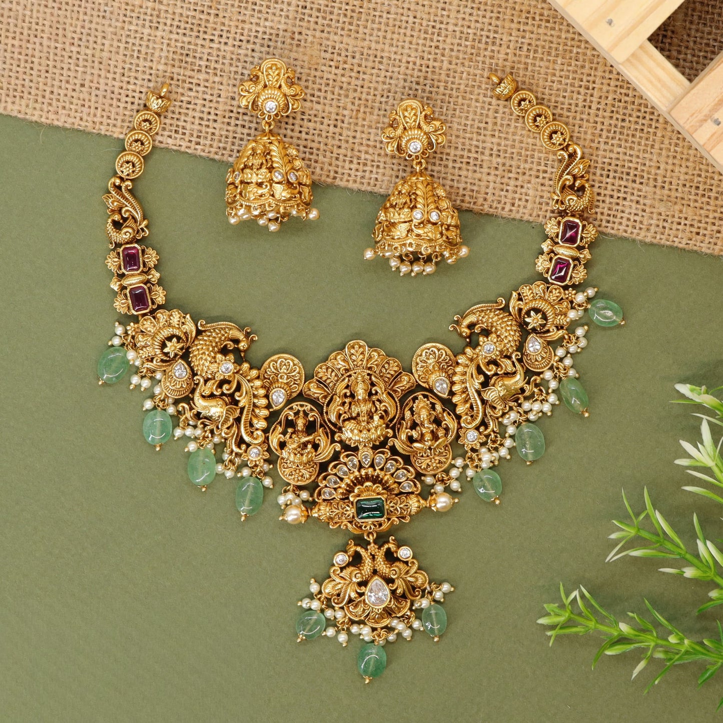 Artistic Statement Necklace with Lakshmi Idols and Ornamental Layout