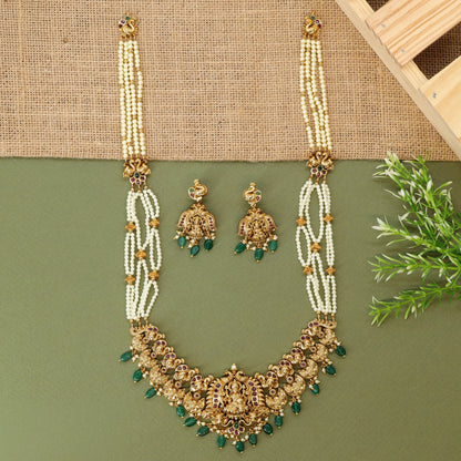 Traditional long haara with Lakshmi centrepiece and repeated ornamental links