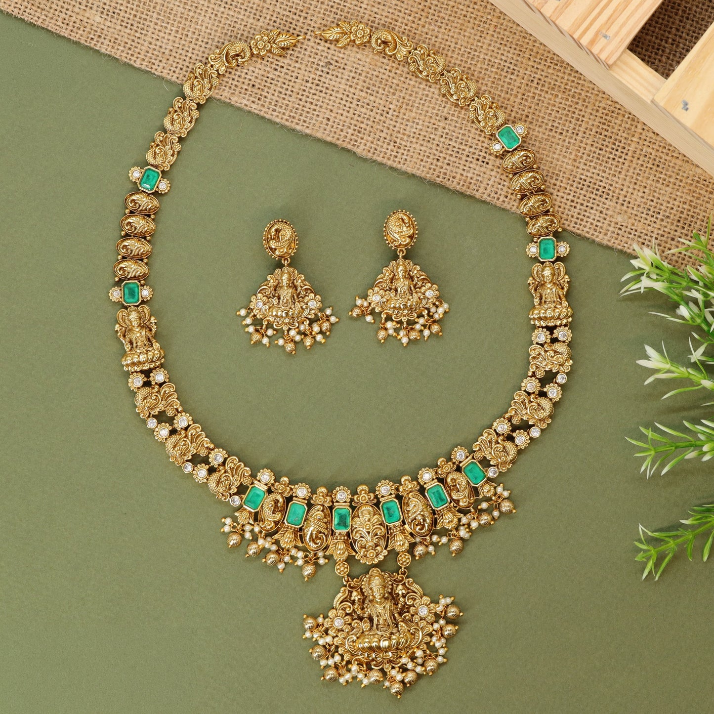Antique long haara with Lakshmi pendant and sculpted floral linkwork