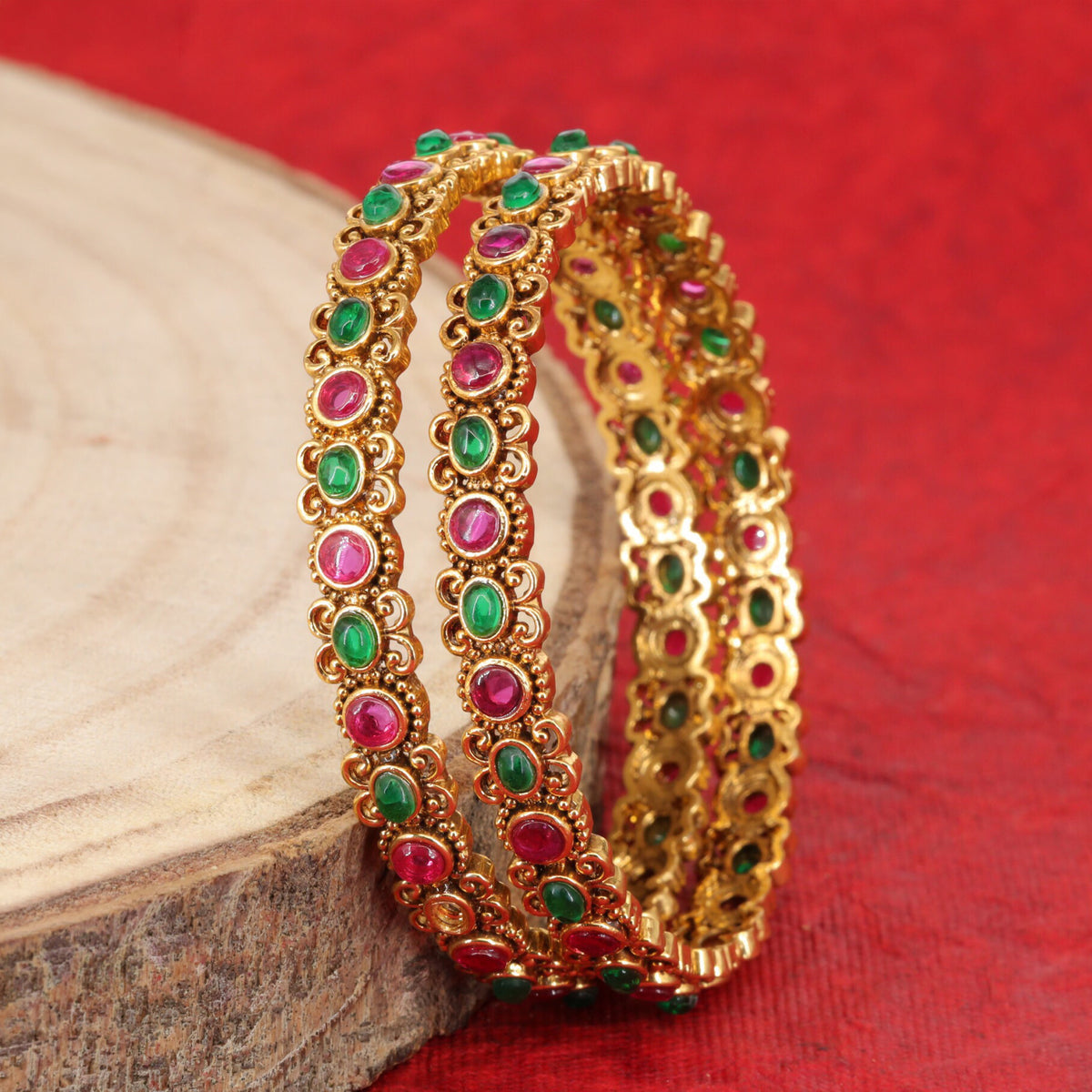 Traditional antique bangles with intricate rounded accents