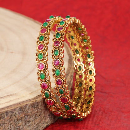 Traditional antique bangles with intricate rounded accents
