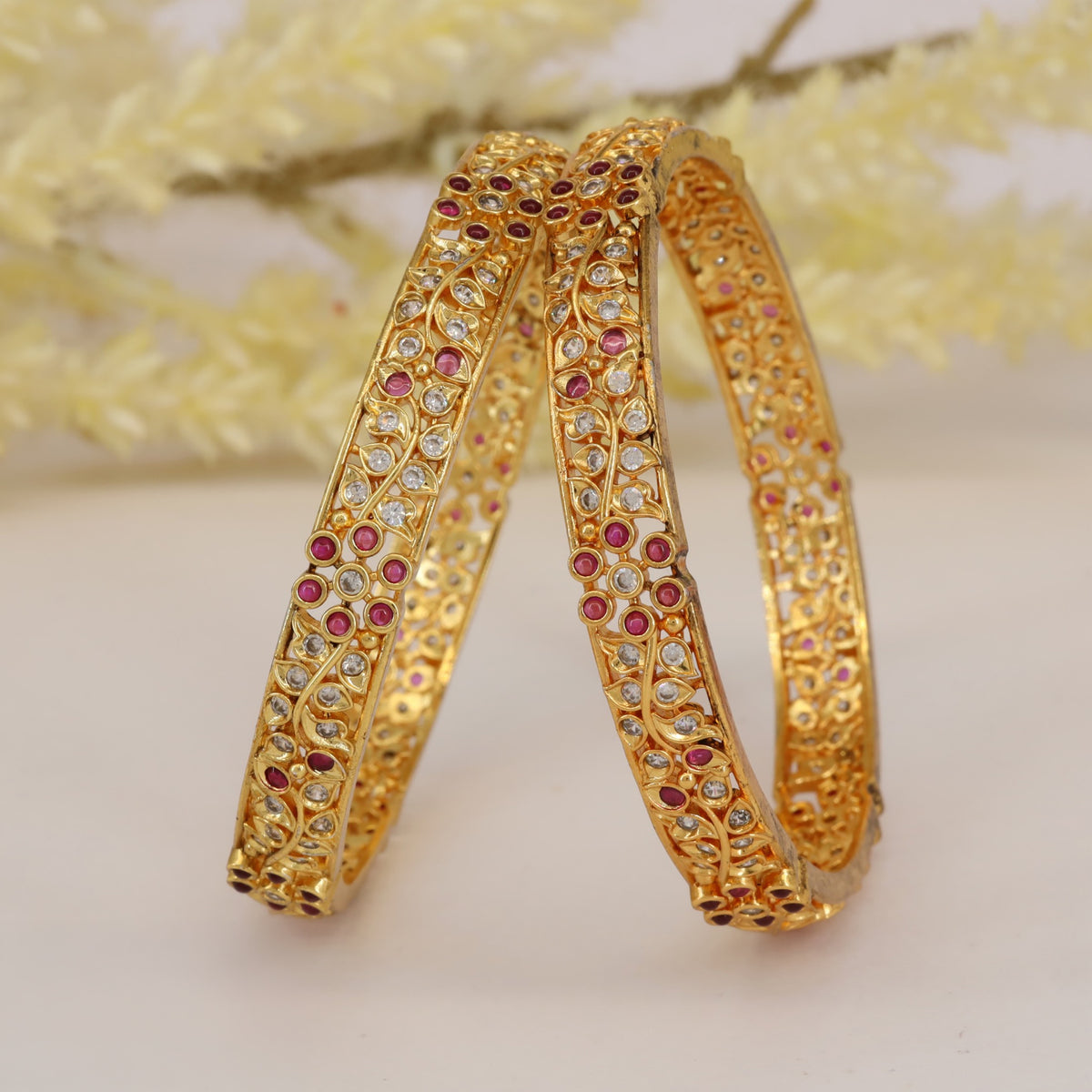 Traditional antique bangles with elegant stonework patterns