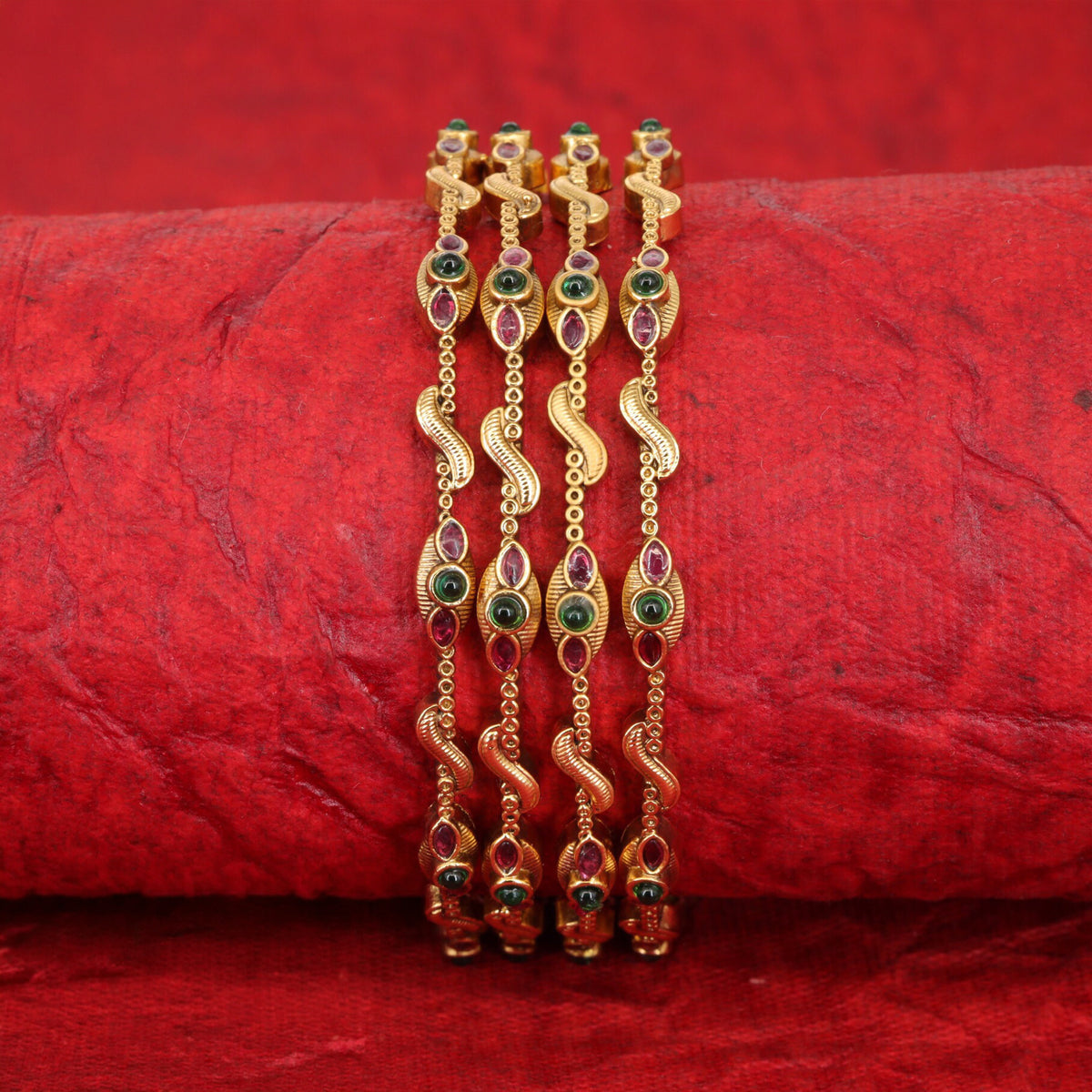 Vintage-inspired antique bangles with ornate curved detailing