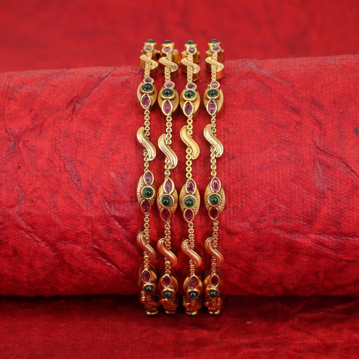 Vintage-inspired antique bangles with ornate curved detailing