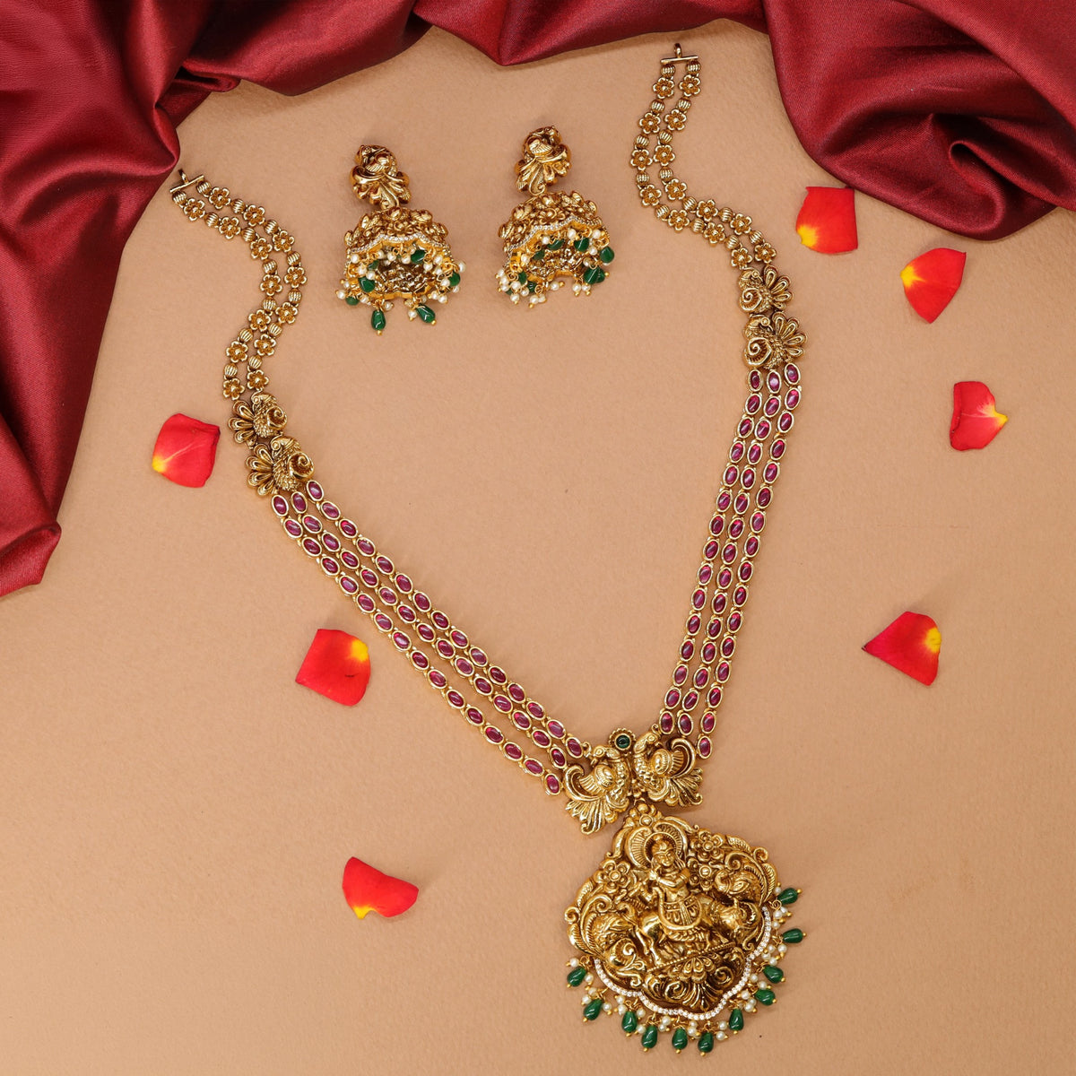 Antique Krishna long haara with sculpted deity work and graceful floral chainwork