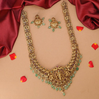 Radiant Lakshmi Vishu Temple Long Haara with Intricate Central Goddess Panel and Ornate Detailing