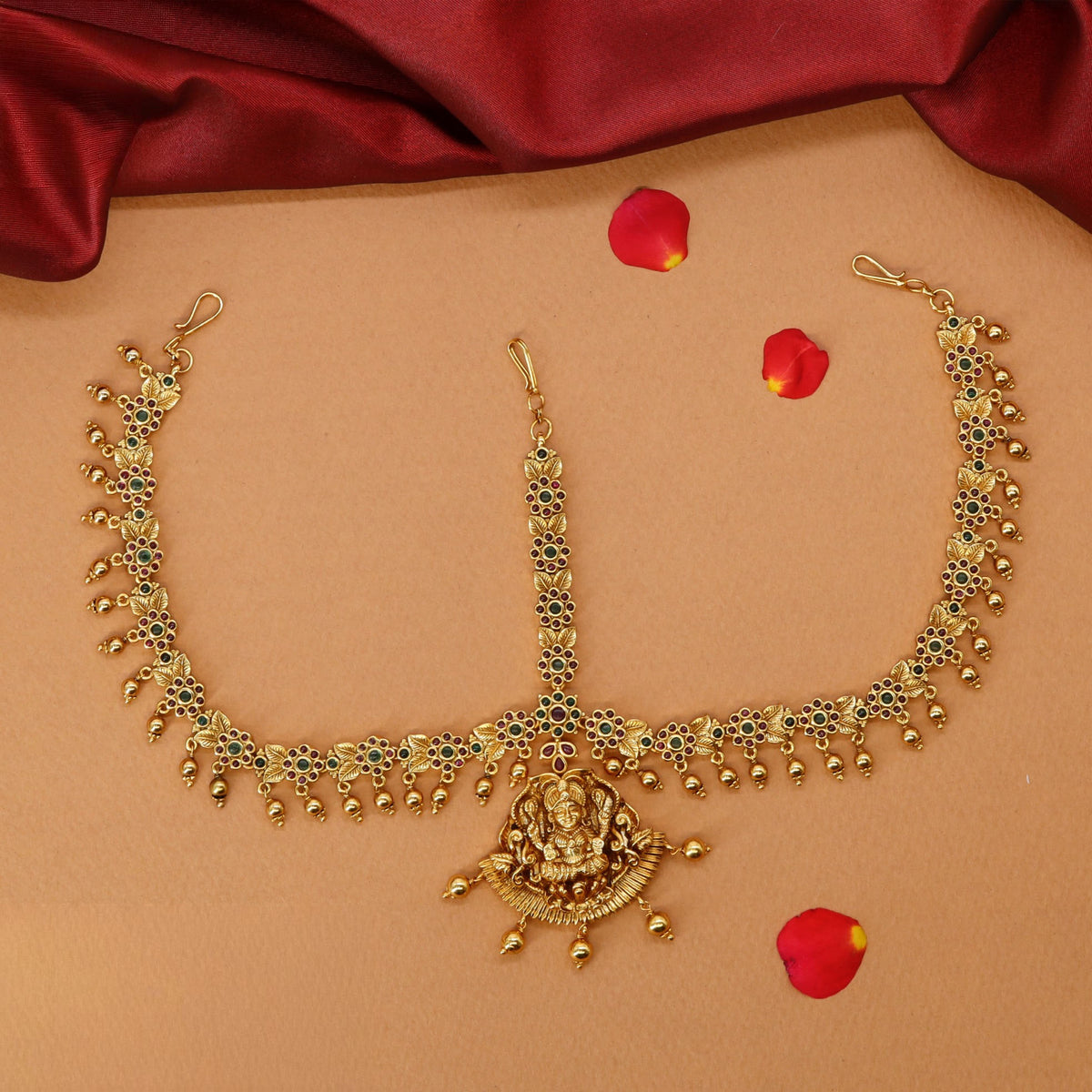 Radiant Lakshmi Motif Headset with Floral Chain and Hanging Drops