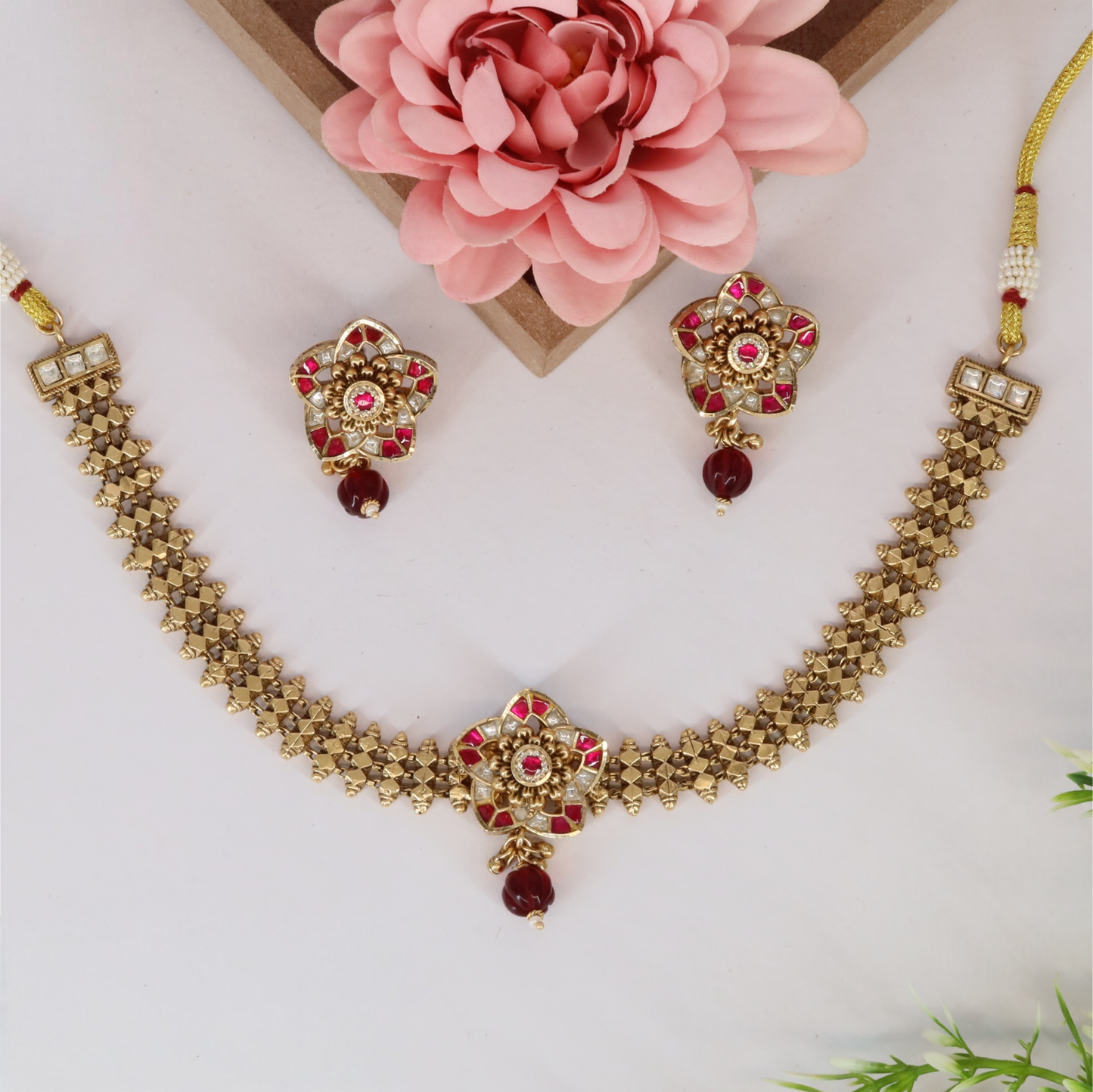 Signature Kundan Choker Necklace With Ruby Floral Elements And Gold Texture Design