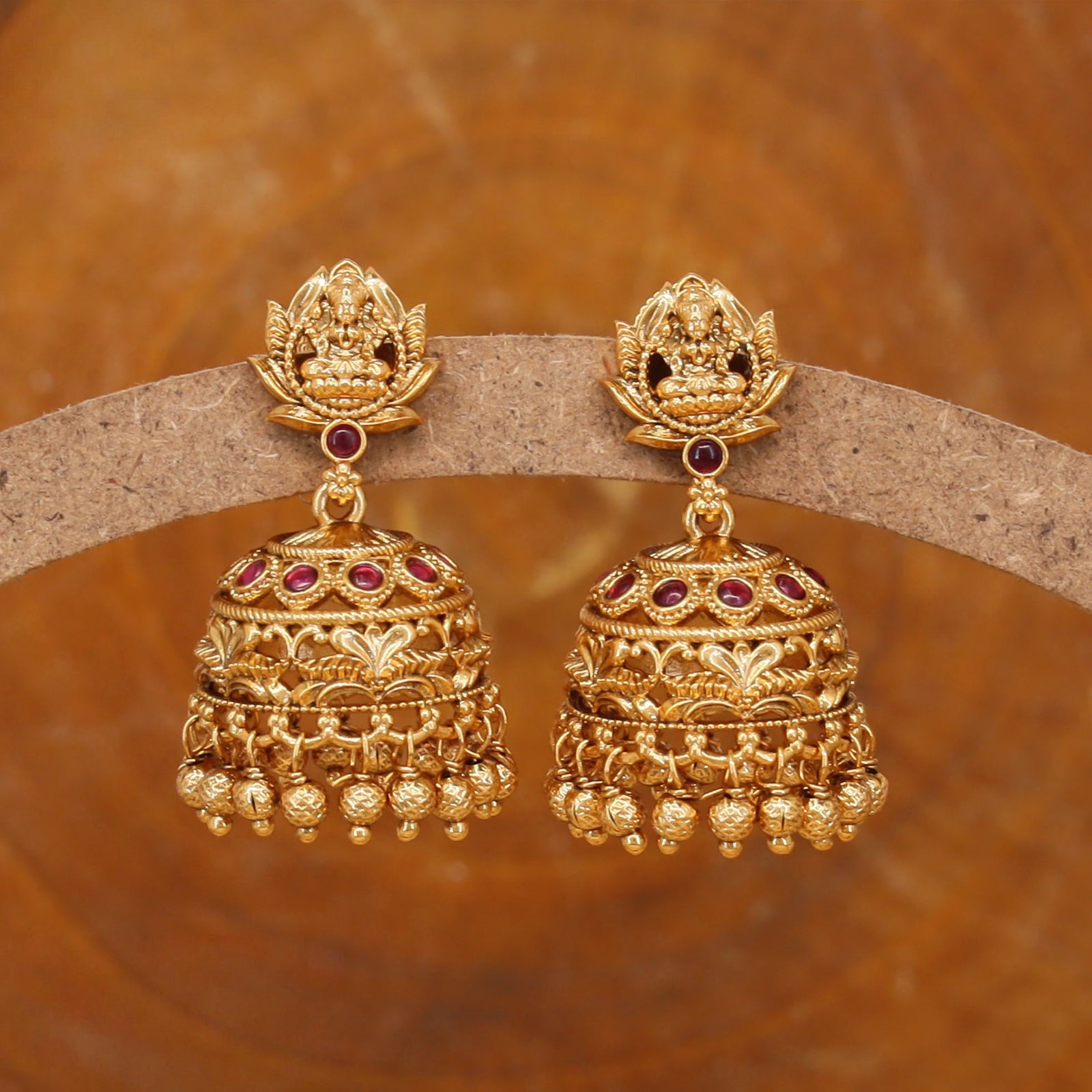 Classic temple jumka with sculpted top and hanging bead fringe