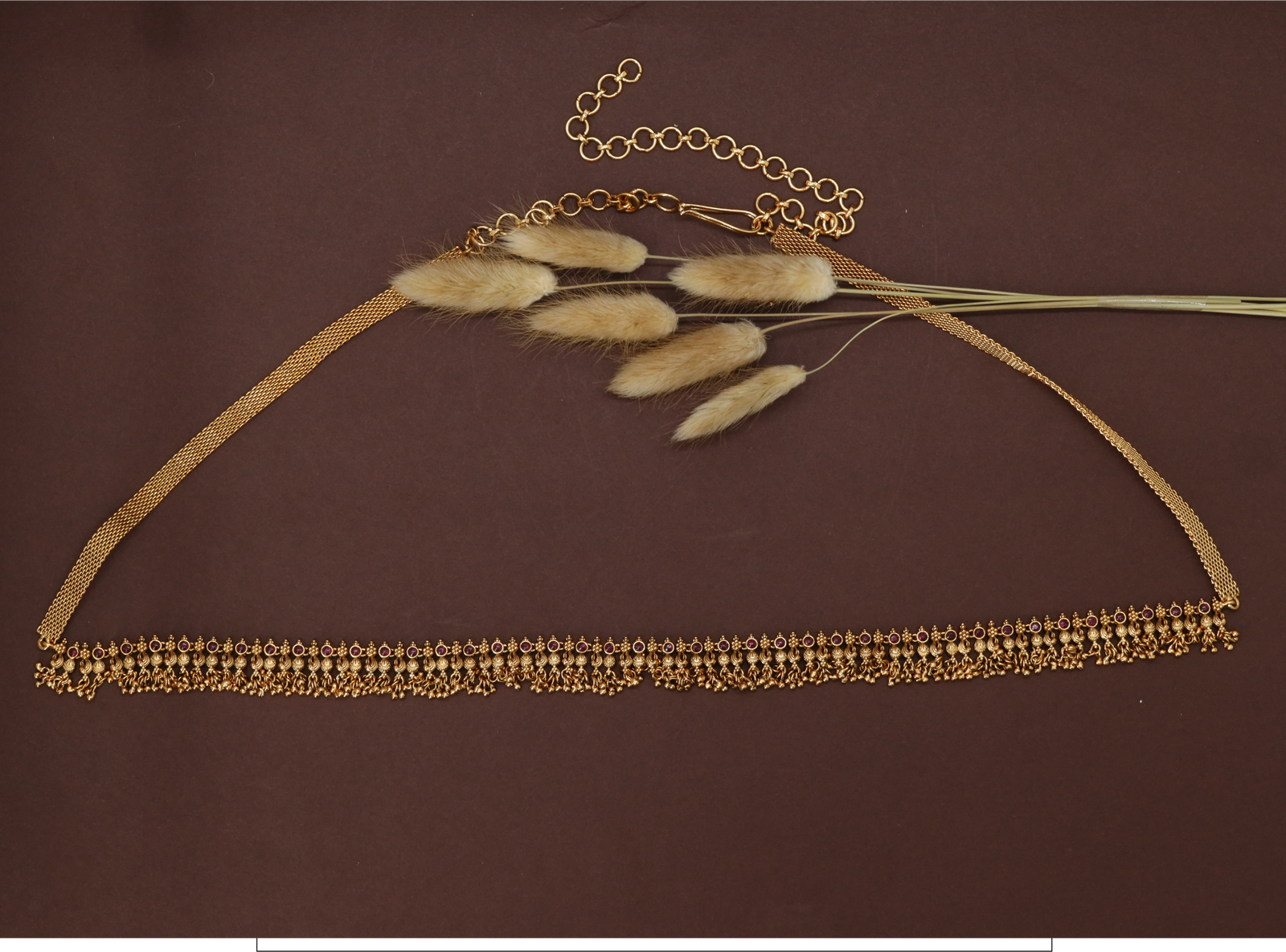 Radiant bead fringe waist belt with slim band and continuous drop detailing