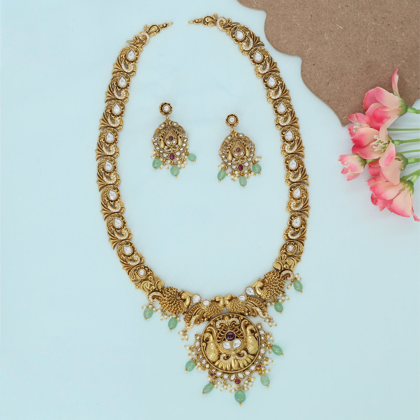 Oval Link Long Haara with Leaf Motifs and Hanging Bead Accents