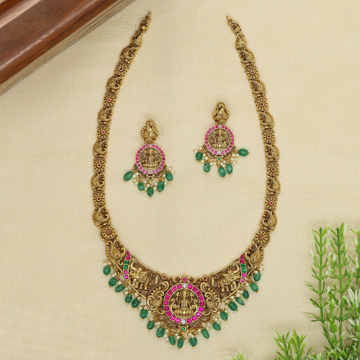 Heritage Style Long Haara with Lakshmi Coin Pendant and Detailed Elephant Motif Panels