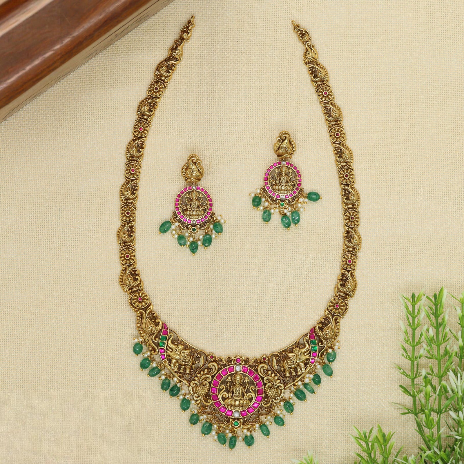 Heritage Style Long Haara with Lakshmi Coin Pendant and Detailed Elephant Motif Panels