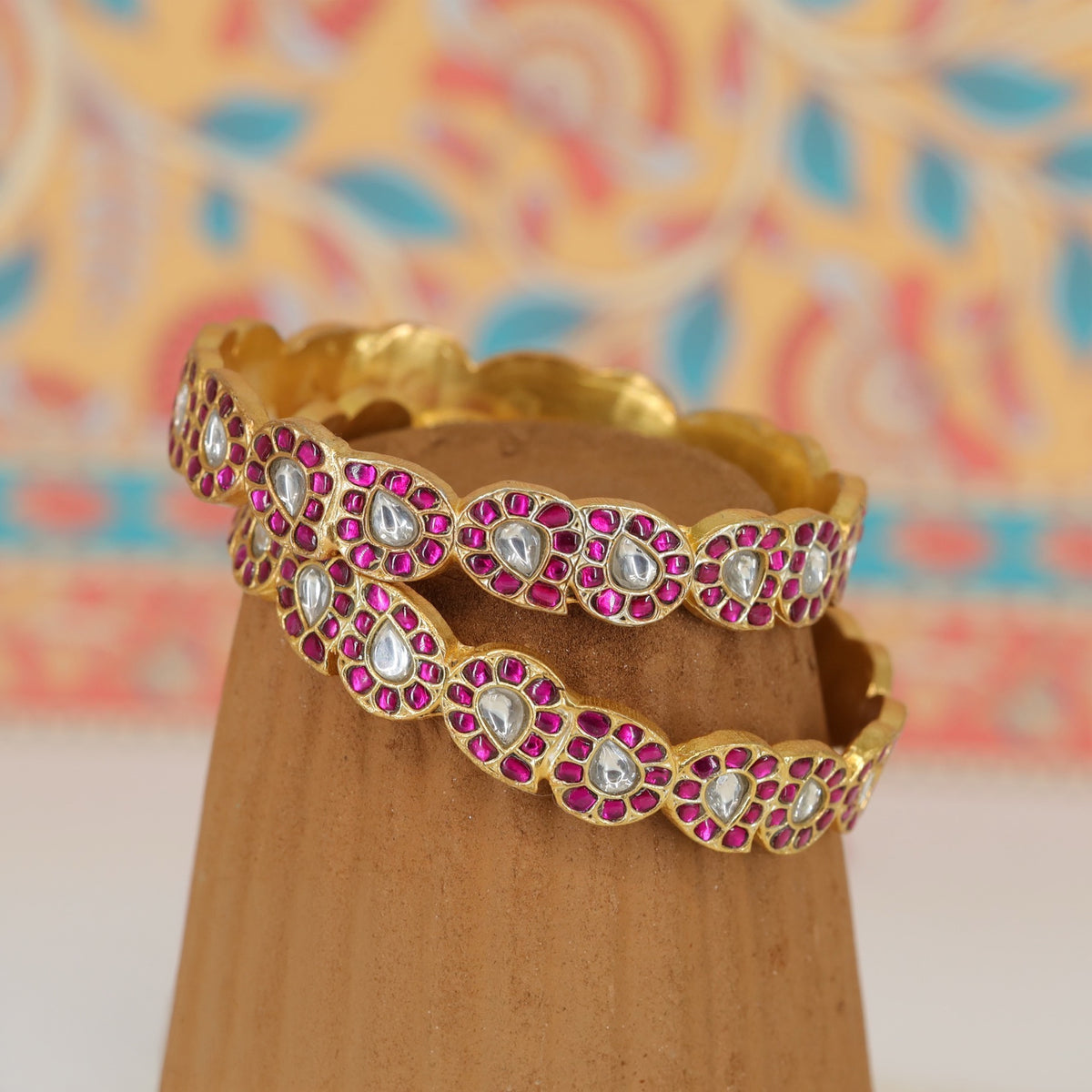 Graceful Jadau Bangles with Repeating Floral-Inspired Design