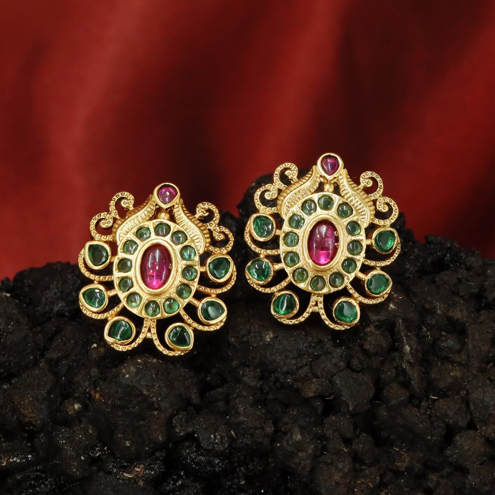 Detailed Medallion Stud Earrings with Oval Core and Surrounding Petal Formation