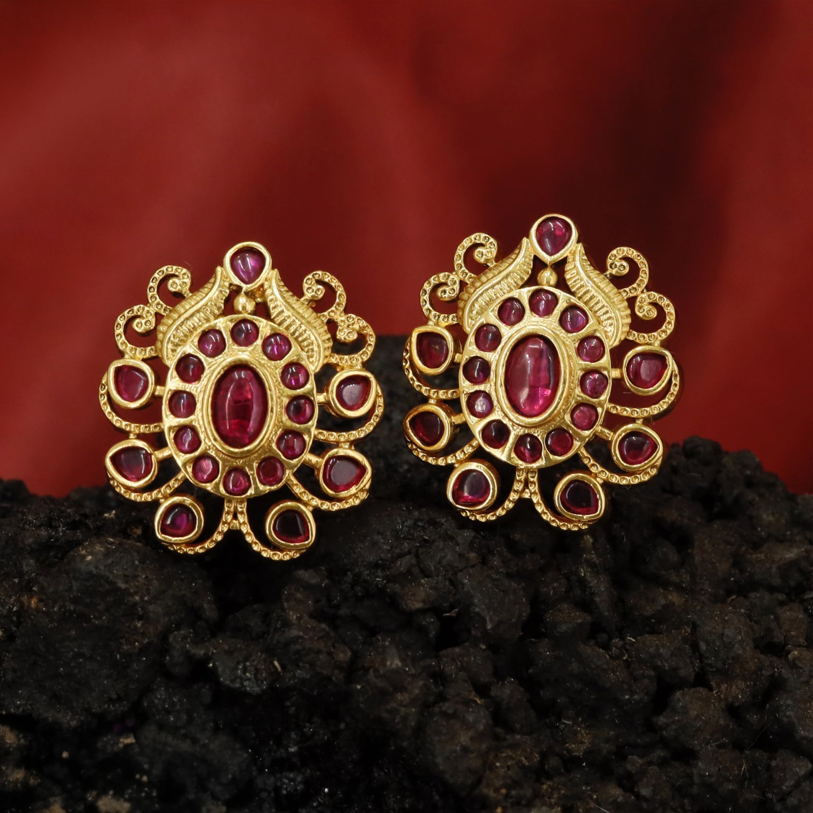 Detailed Medallion Stud Earrings with Oval Core and Surrounding Petal Formation