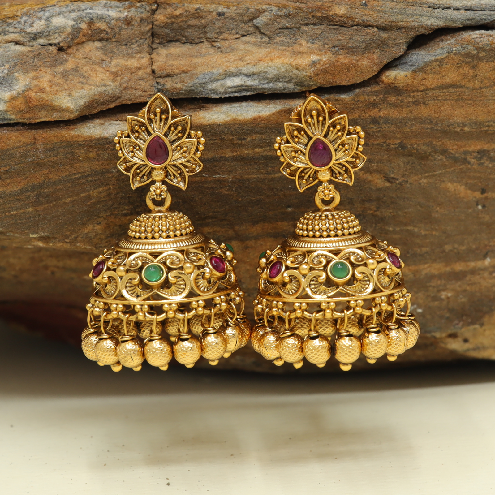 Floral Spread Stud Jumka with Carved Dome Form and Continuous Bead Hangings