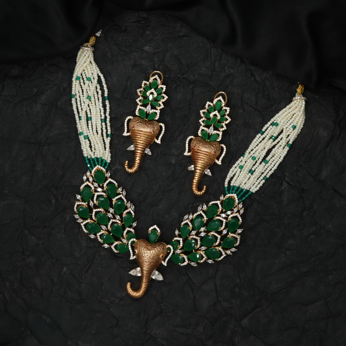Intricately Crafted Crystal Rose Gold Necklace with Elephant Accents