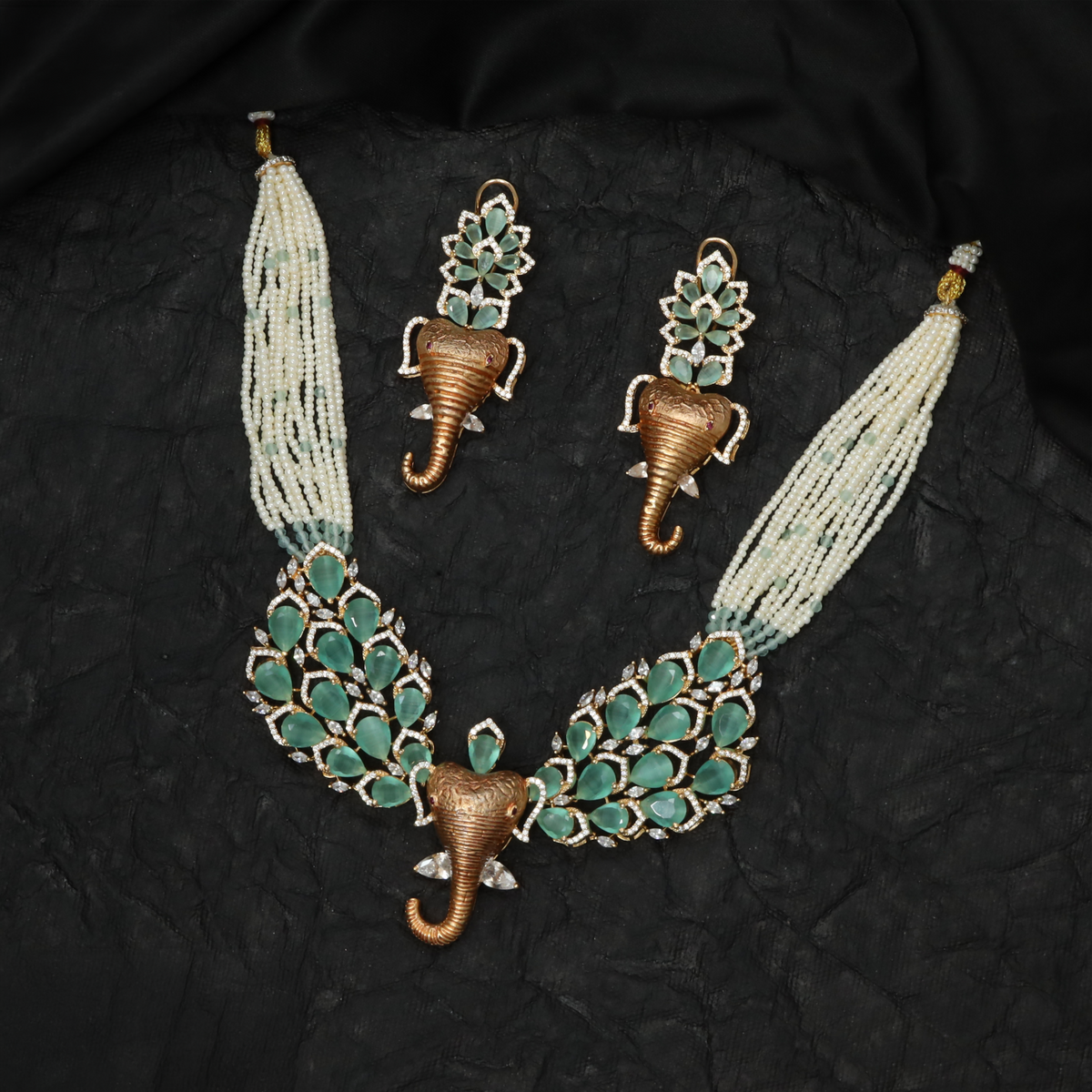 Intricately Crafted Crystal Rose Gold Necklace with Elephant Accents