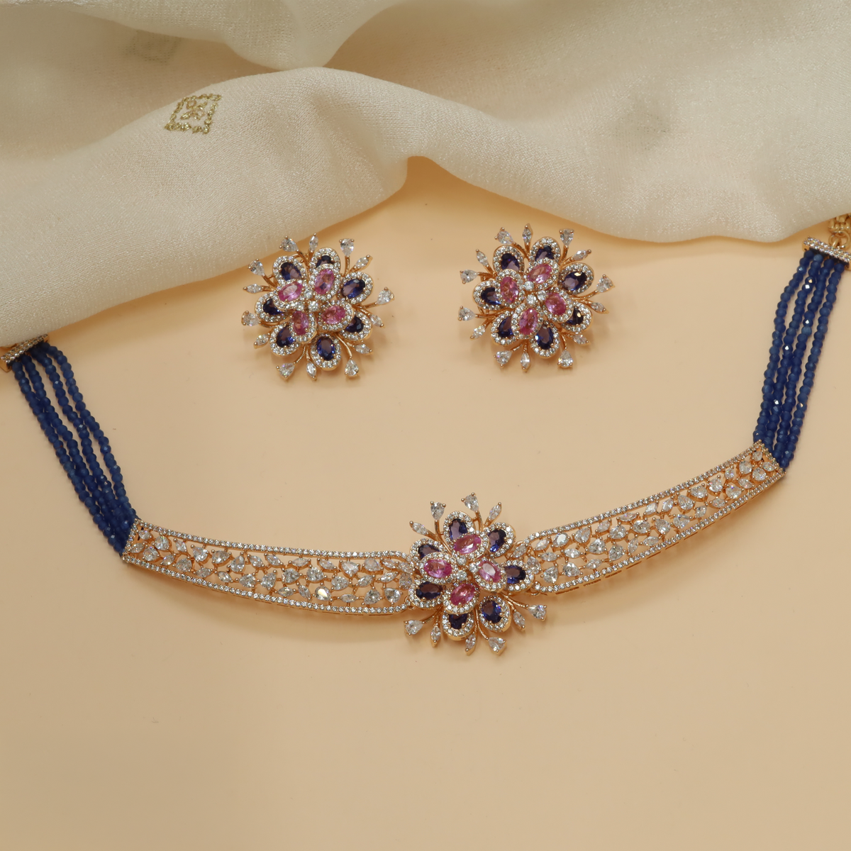 Rose gold choker with an elaborate botanical centrepiece