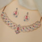 Rose gold crystal necklace with an artistic sequence of interlocking loops