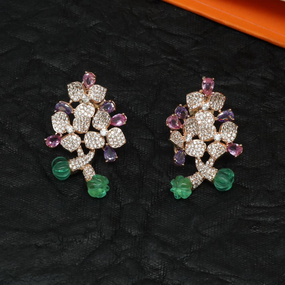 Elegant floral spray studs with an intricate openwork finish