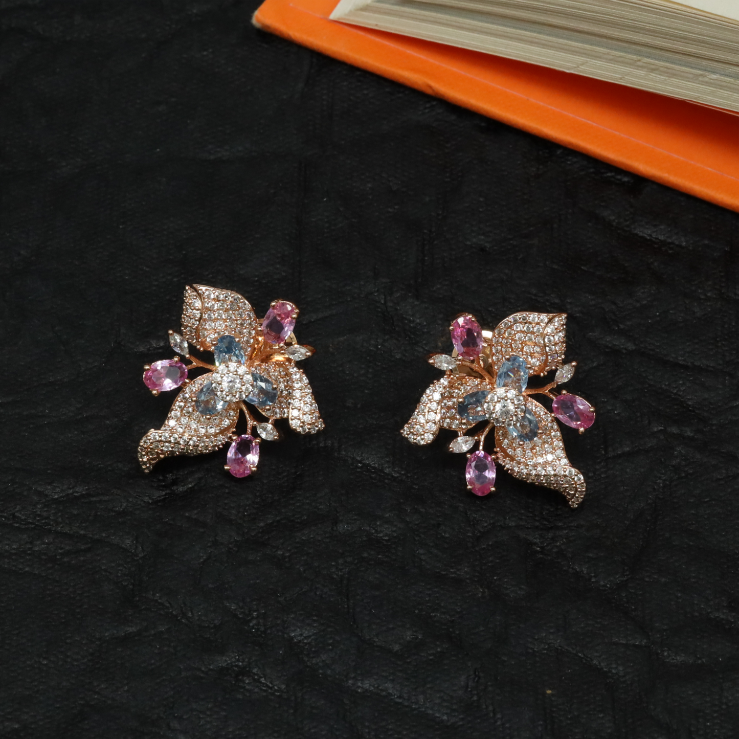 Delicate Botanical Stud with Flowing Leaf Motifs and Floral Centre Structure