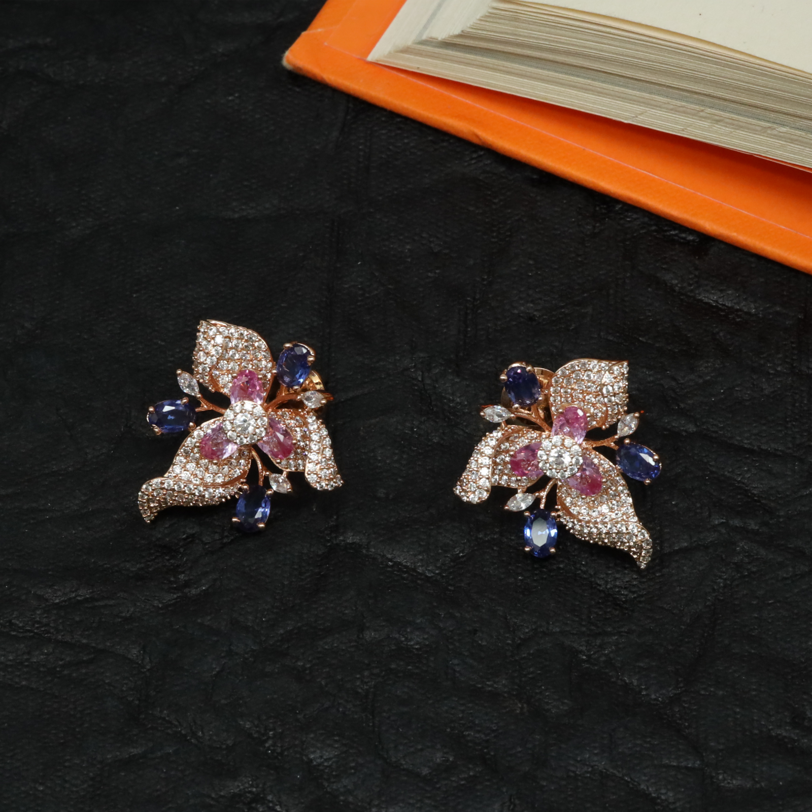 Delicate Botanical Stud with Flowing Leaf Motifs and Floral Centre Structure