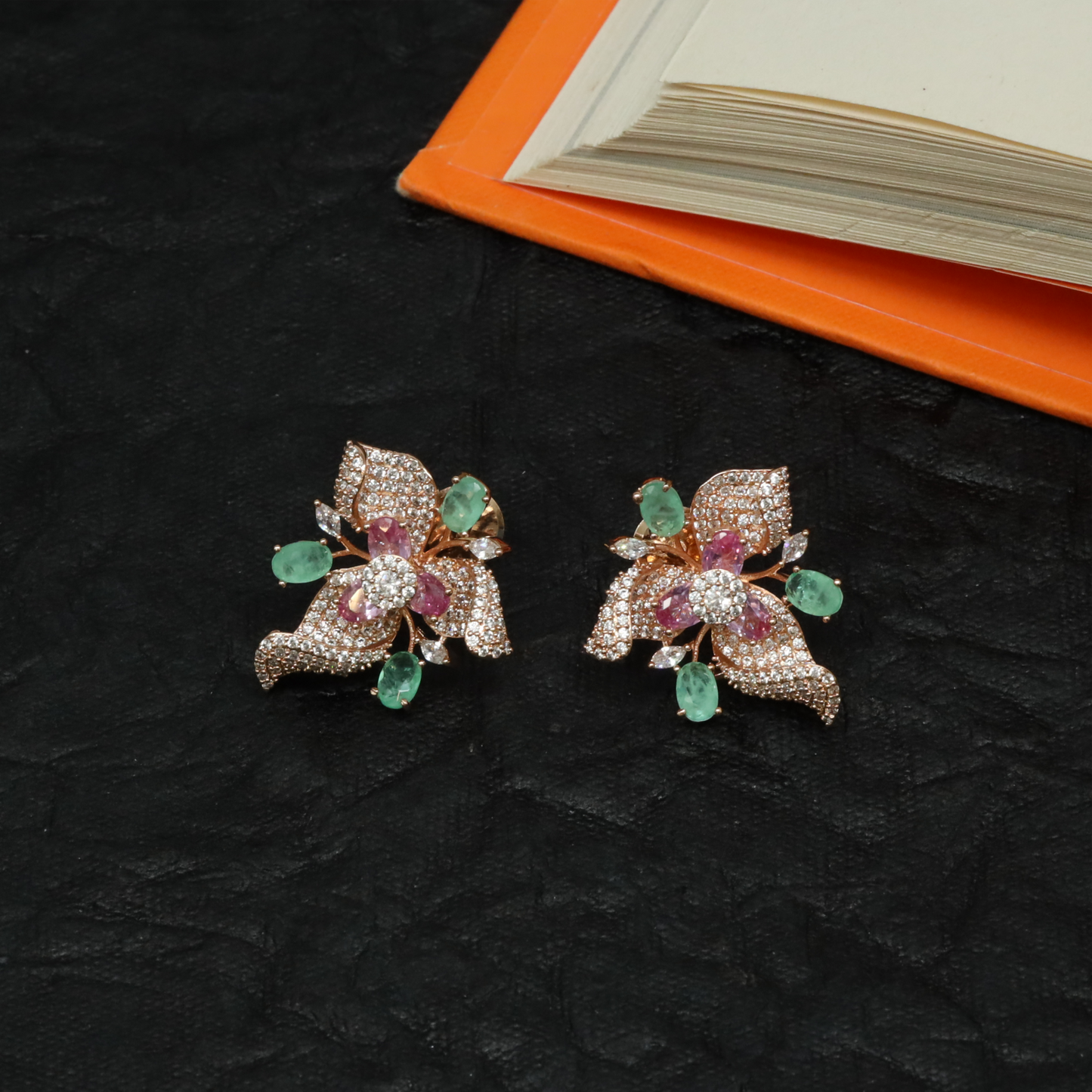 Delicate Botanical Stud with Flowing Leaf Motifs and Floral Centre Structure