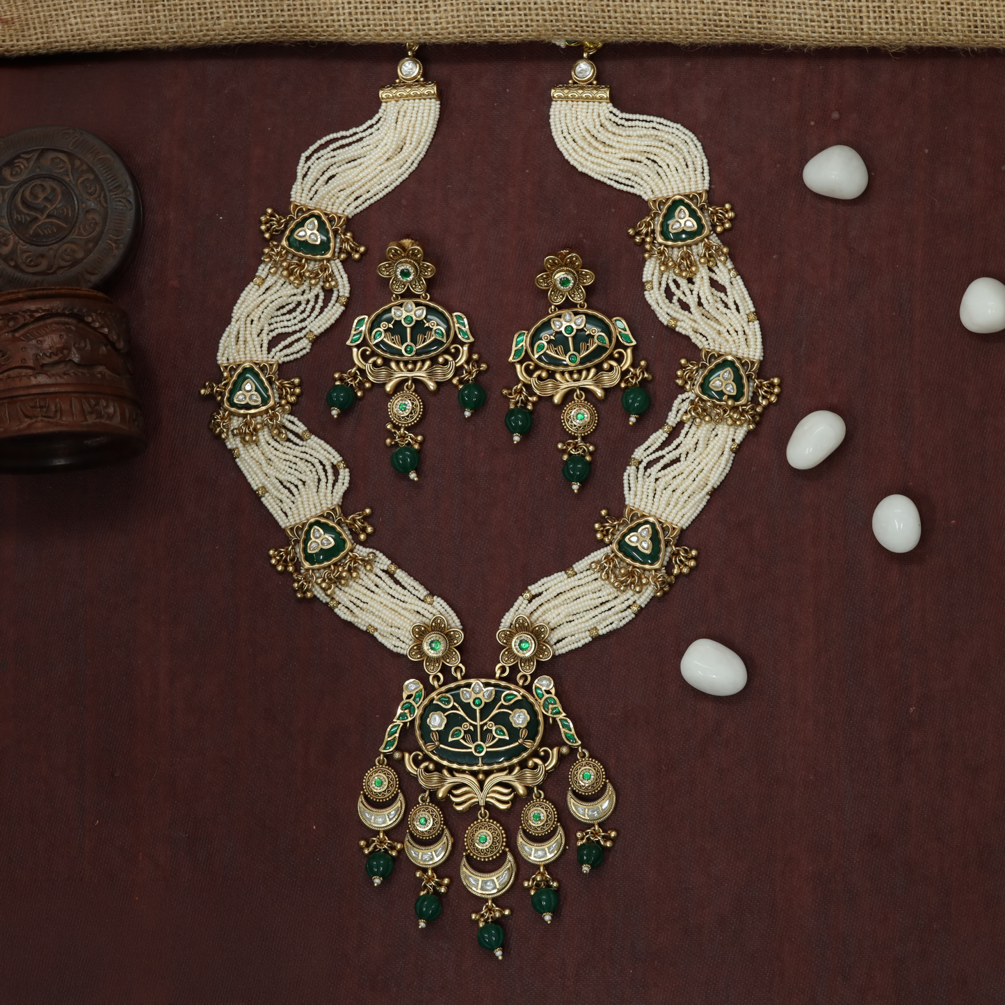 Floral framed Kundan long haara with intricate bead strands and pendant detailing