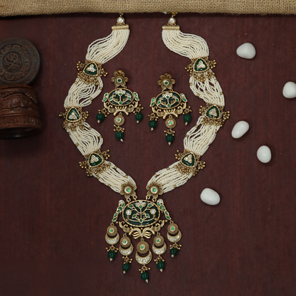 Floral framed Kundan long haara with intricate bead strands and pendant detailing