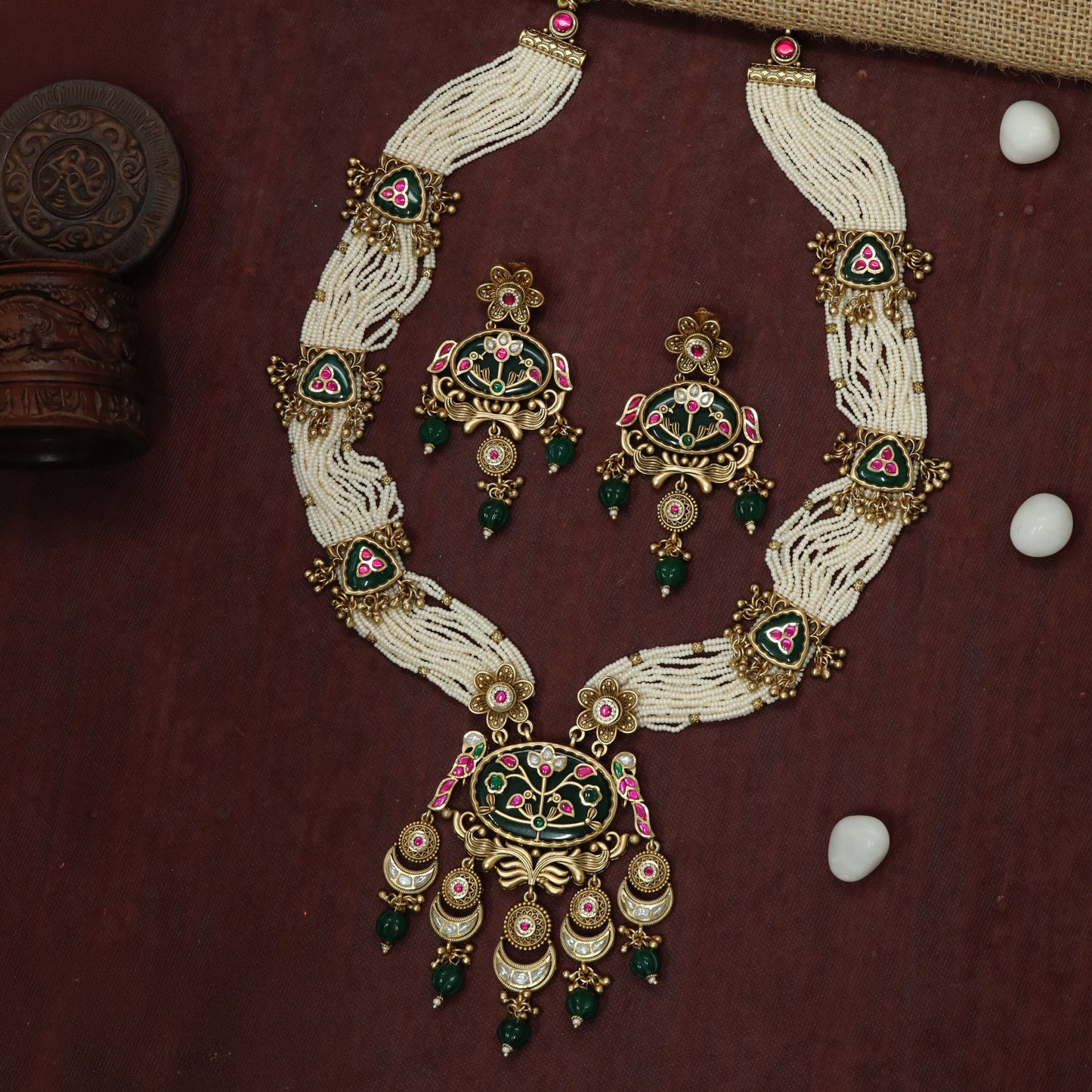 Floral framed Kundan long haara with intricate bead strands and pendant detailing