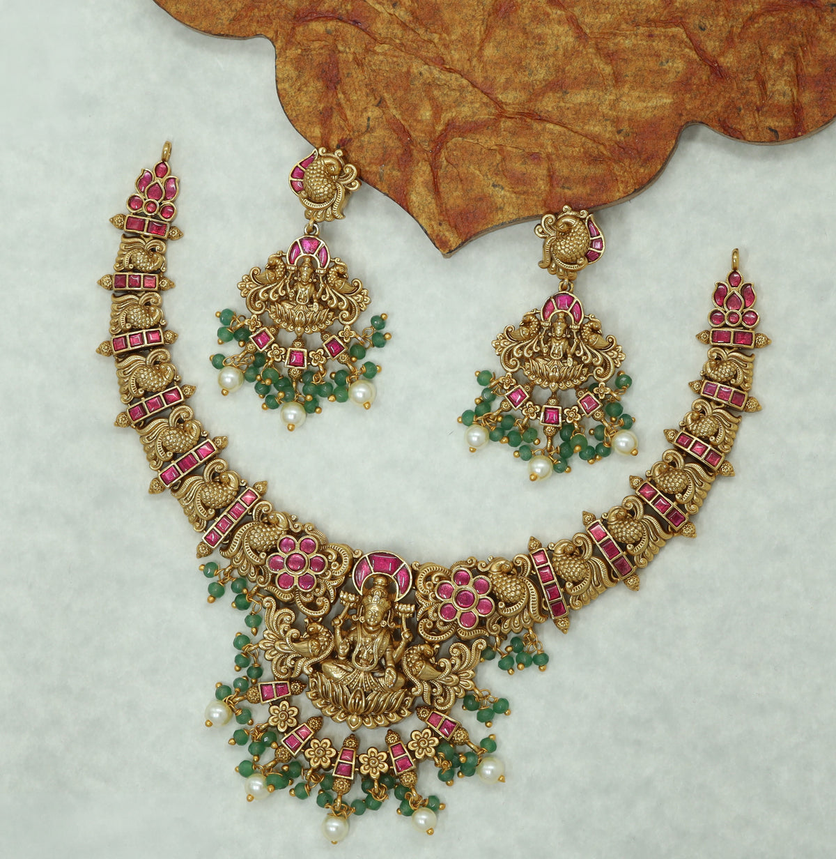 Antique Lakshmi Necklace with Intricate Floral and Traditional Detailing