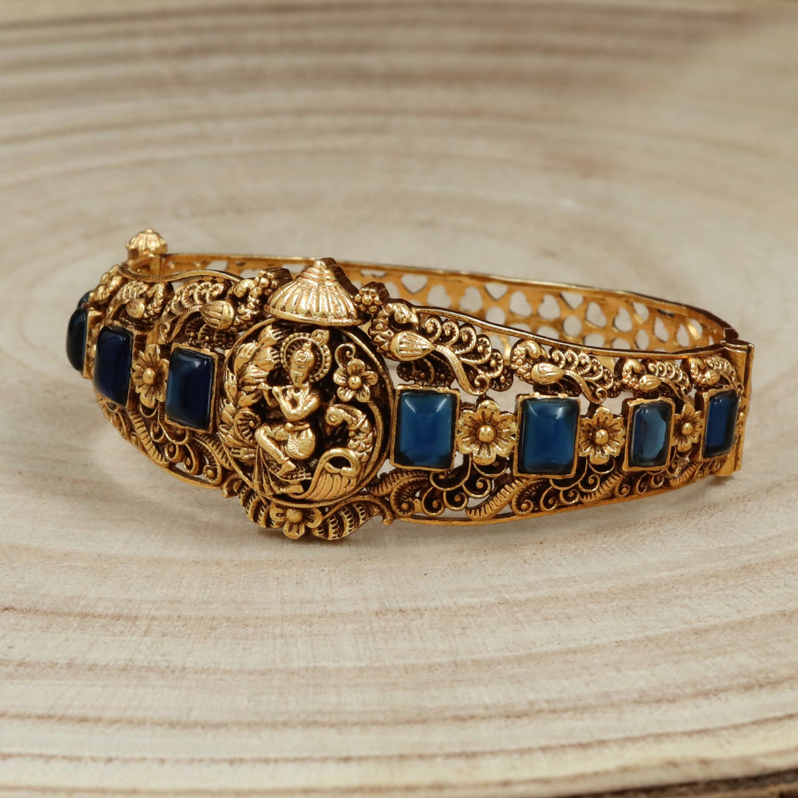Elegant Peacock and Krishna Design Kada with Detailed Carving and Decorative Frames