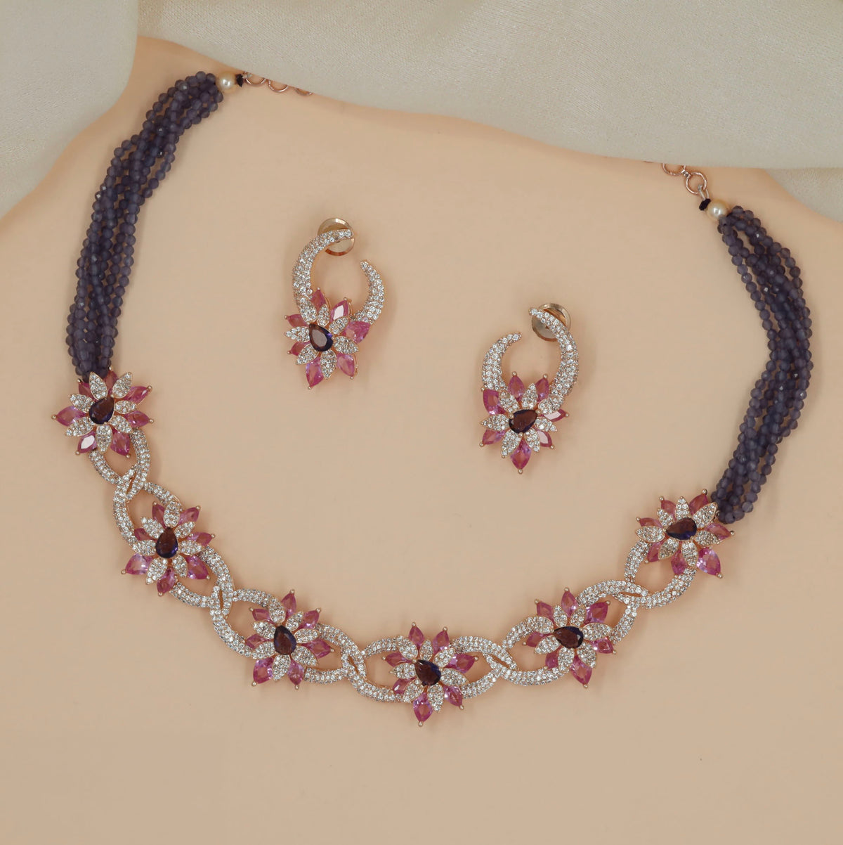 Rose Gold Crystal Necklace Featuring Ornamental Flower Accents
