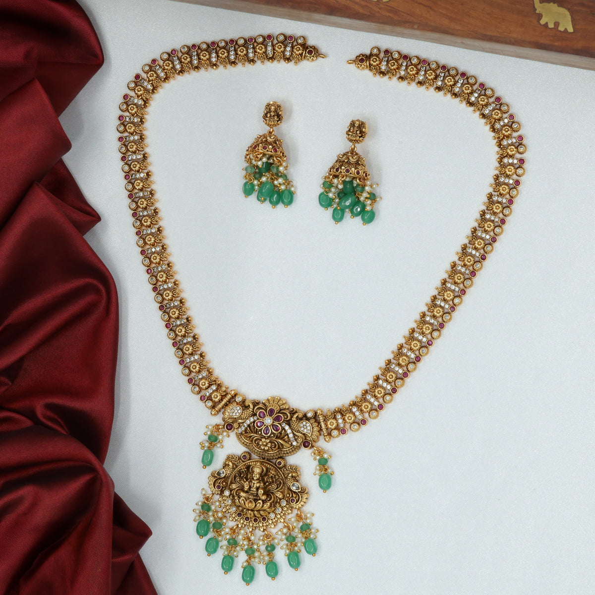 Floral Heritage Antique Long Haara With Ornate Lakshmi Pendant