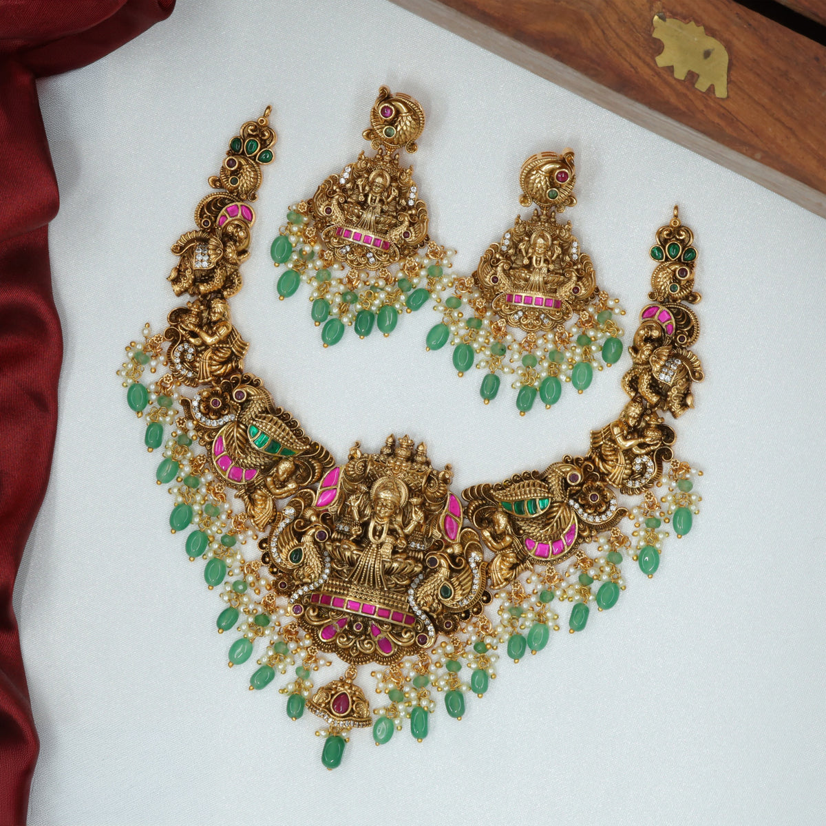 Intricate Lakshmi Antique Necklace Set With Pearl And Drop Accents
