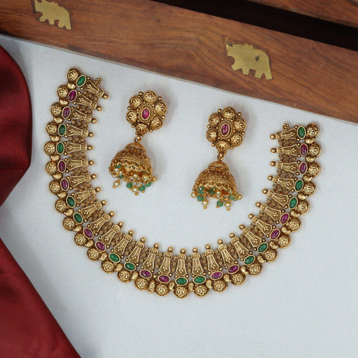 Temple Inspired Antique Necklace With Sculpted Floral Borders