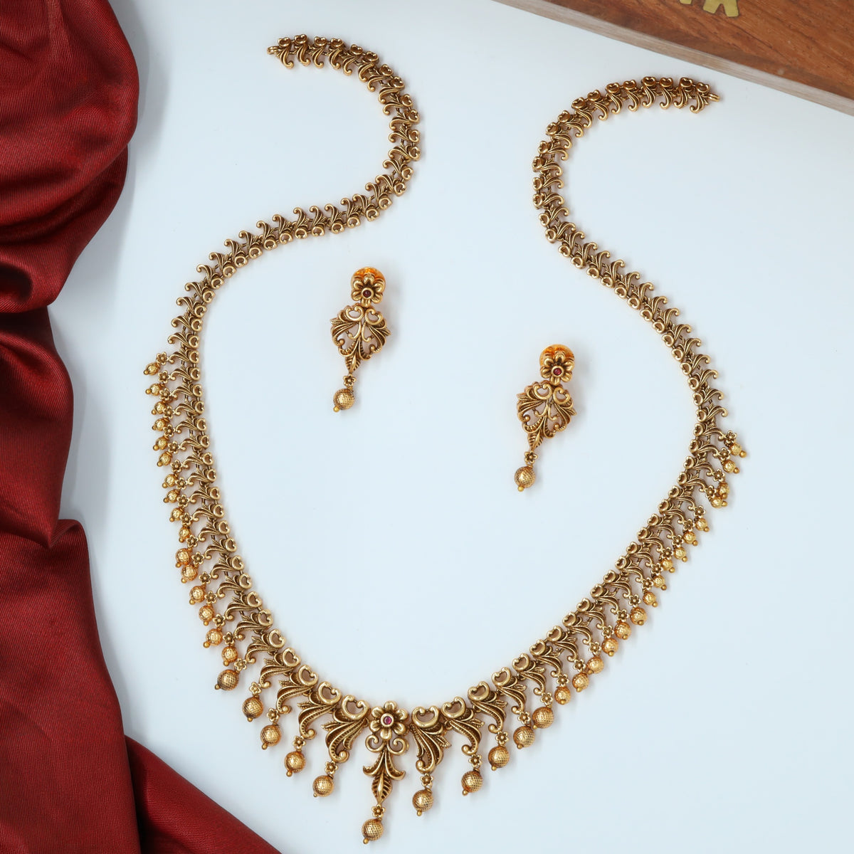 Antique Long Haara with Decorative Drop Details